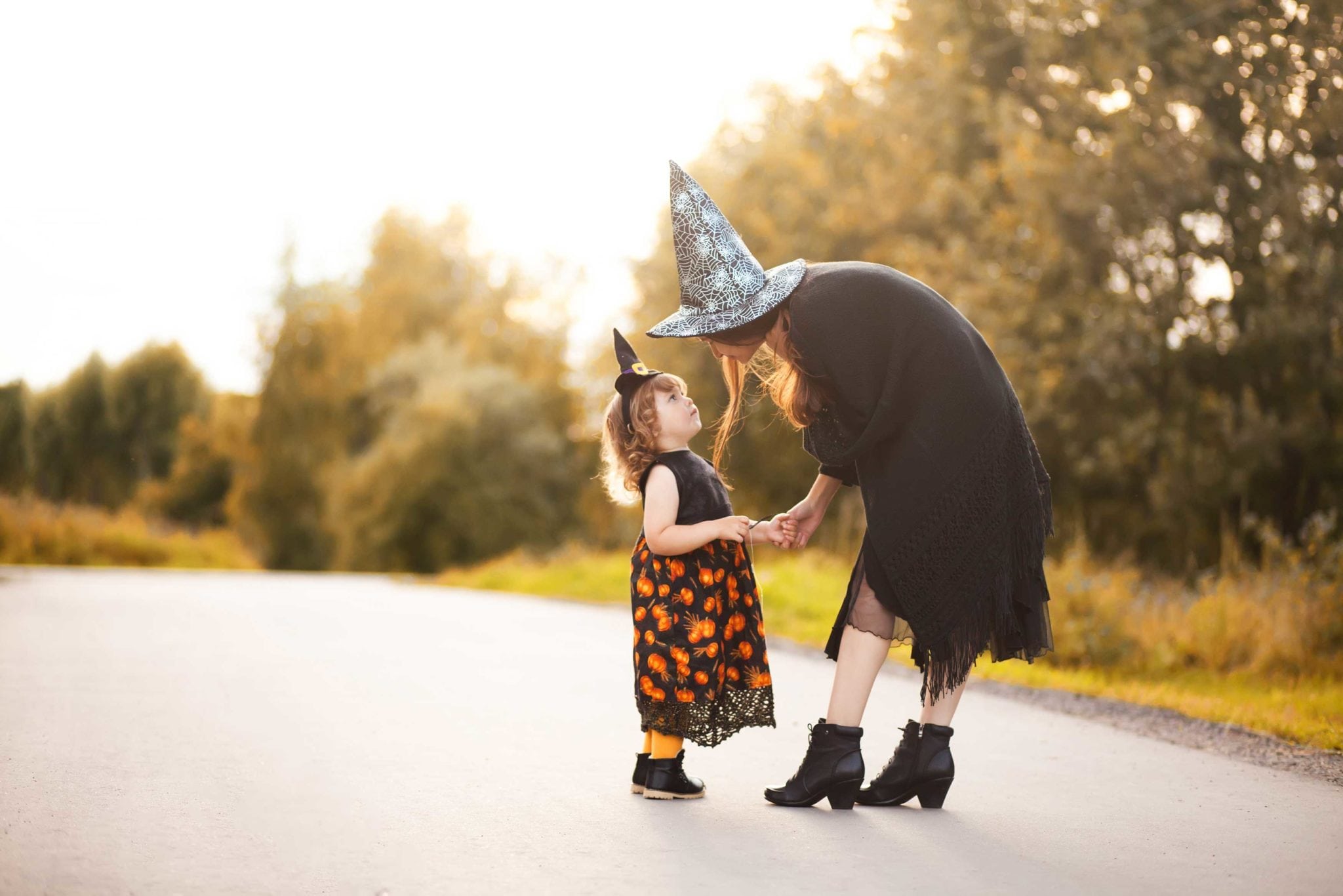 Mother and daughter trick-or-treating.