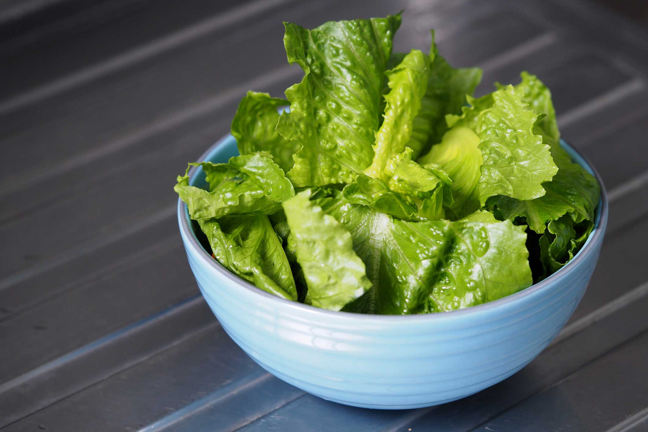 Chopped romaine lettuce in a bowl.