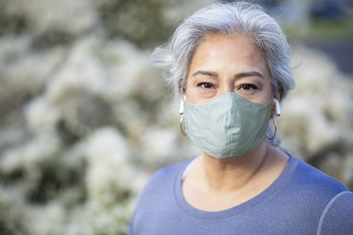 Portrait of a beautiful Mexican Woman Wearing a Mask