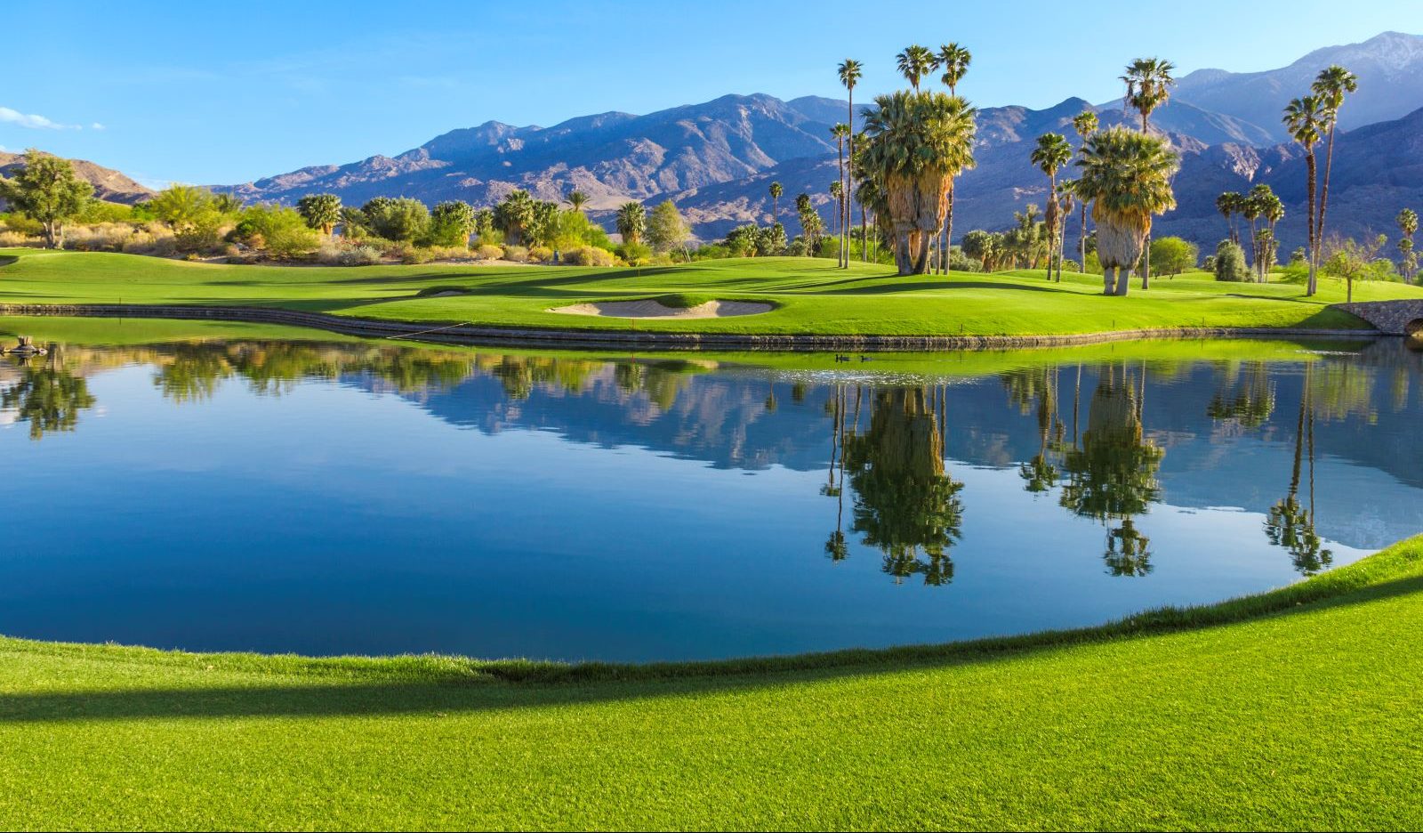 Golf course with water.